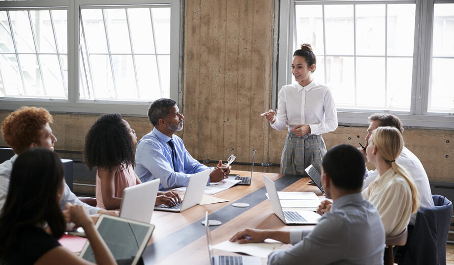 people around a conference table