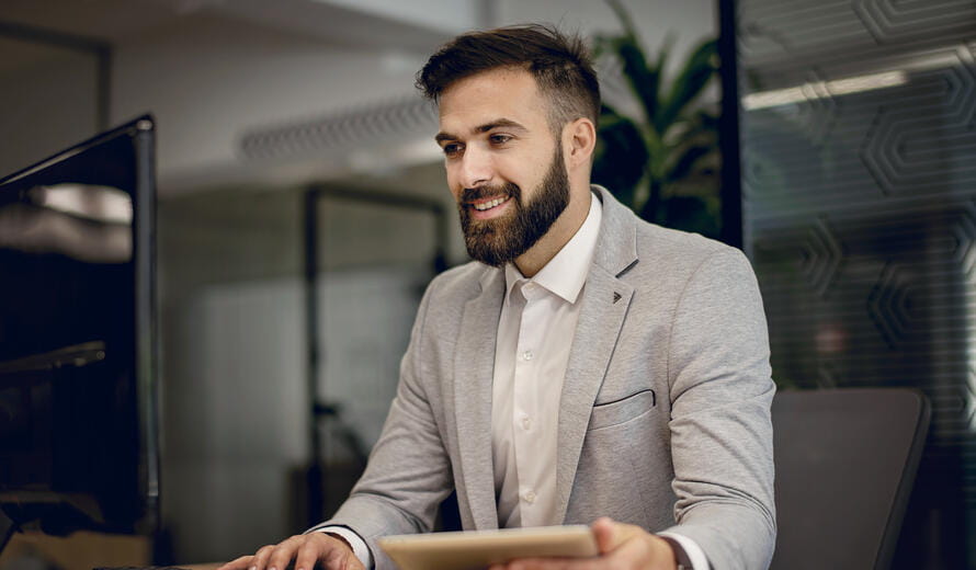 Young businessman working at office