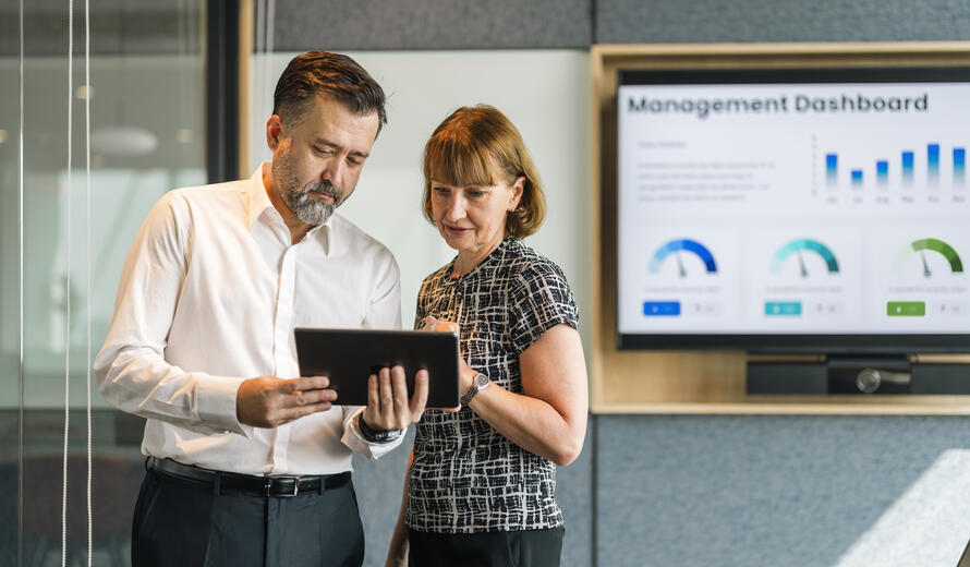 employees looking at data